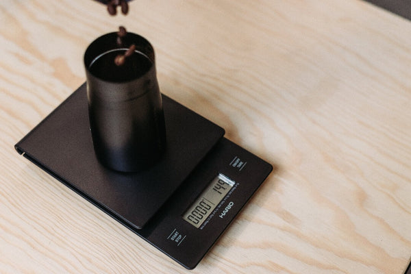 Weighing coffee on Hario Coffee scale