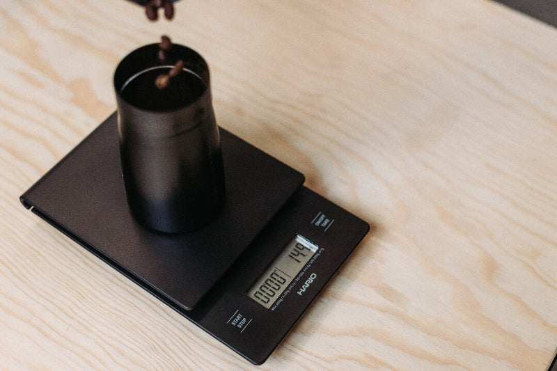Weighing coffee on Hario Coffee scale
